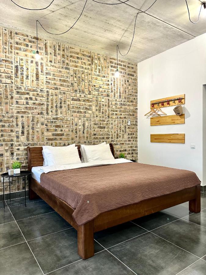 Designer Apartments In The City Center Ровно Экстерьер фото