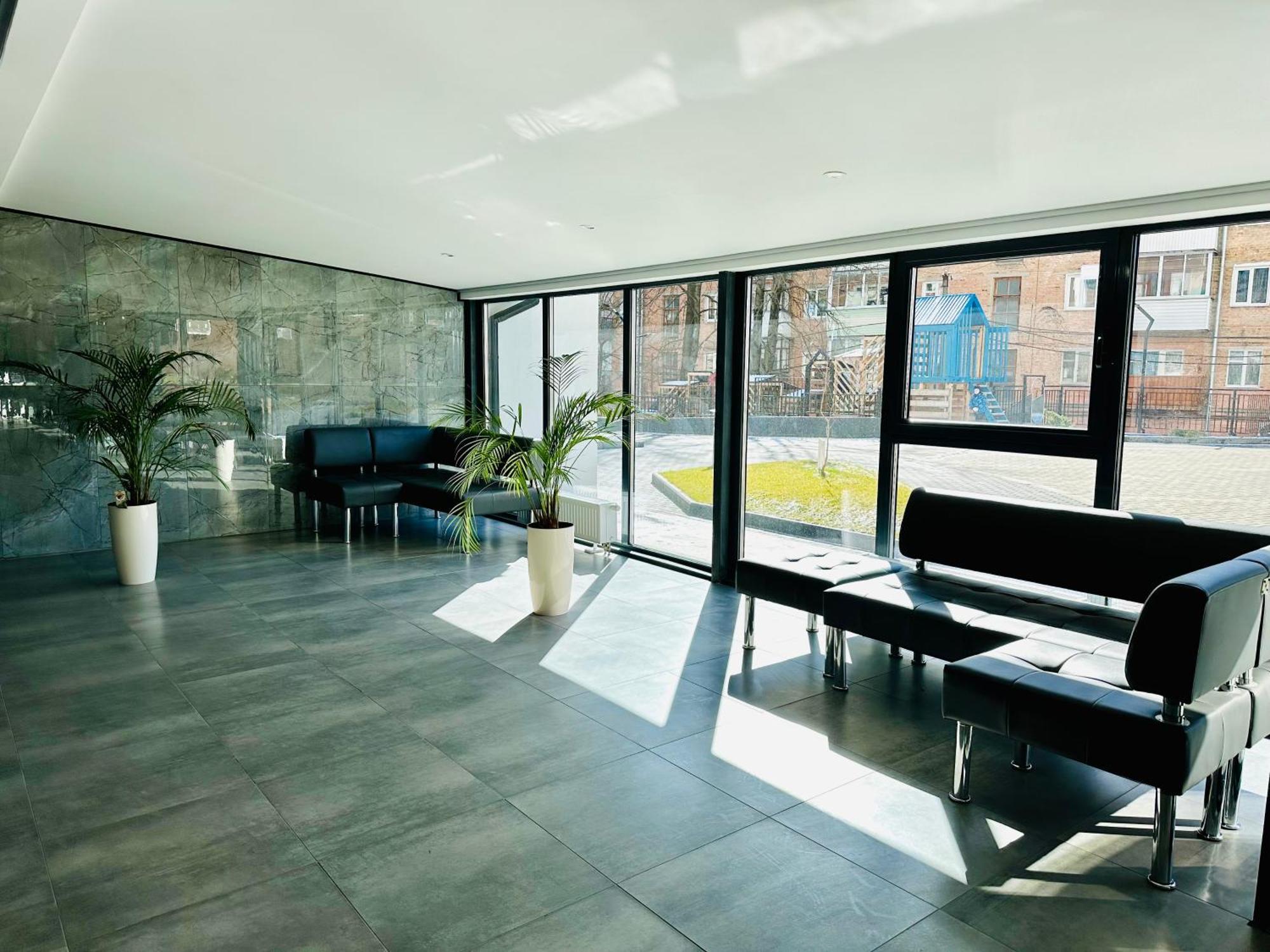 Designer Apartments In The City Center Ровно Экстерьер фото